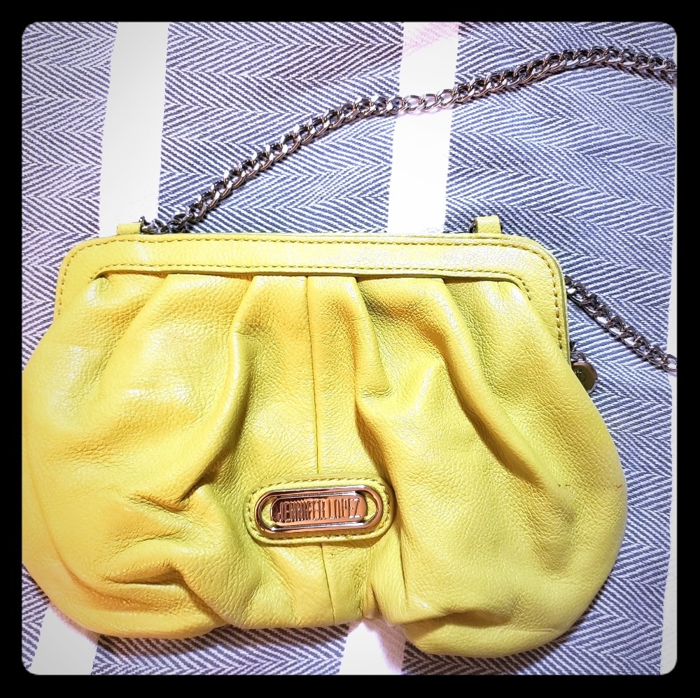 Jennifer Lopez clutch w/ silver strap